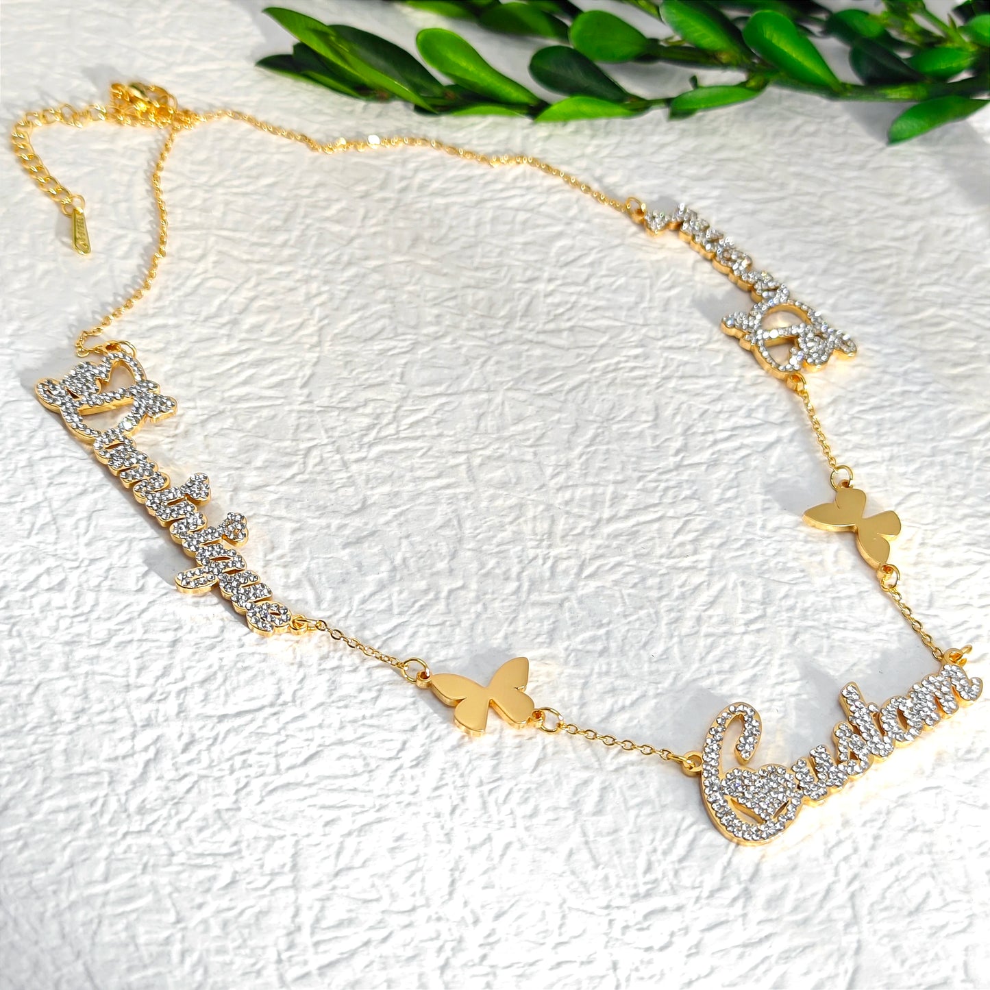 Crystal custom multi-name necklace with butterfly charm, high-quality and affordable, from Queendom Treasurez