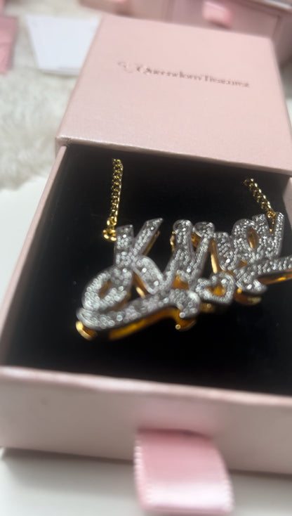 Double-plated crystal custom name necklace with personalized engraving and crystal accents, gold or silver finish – Queendom Treasurez.






