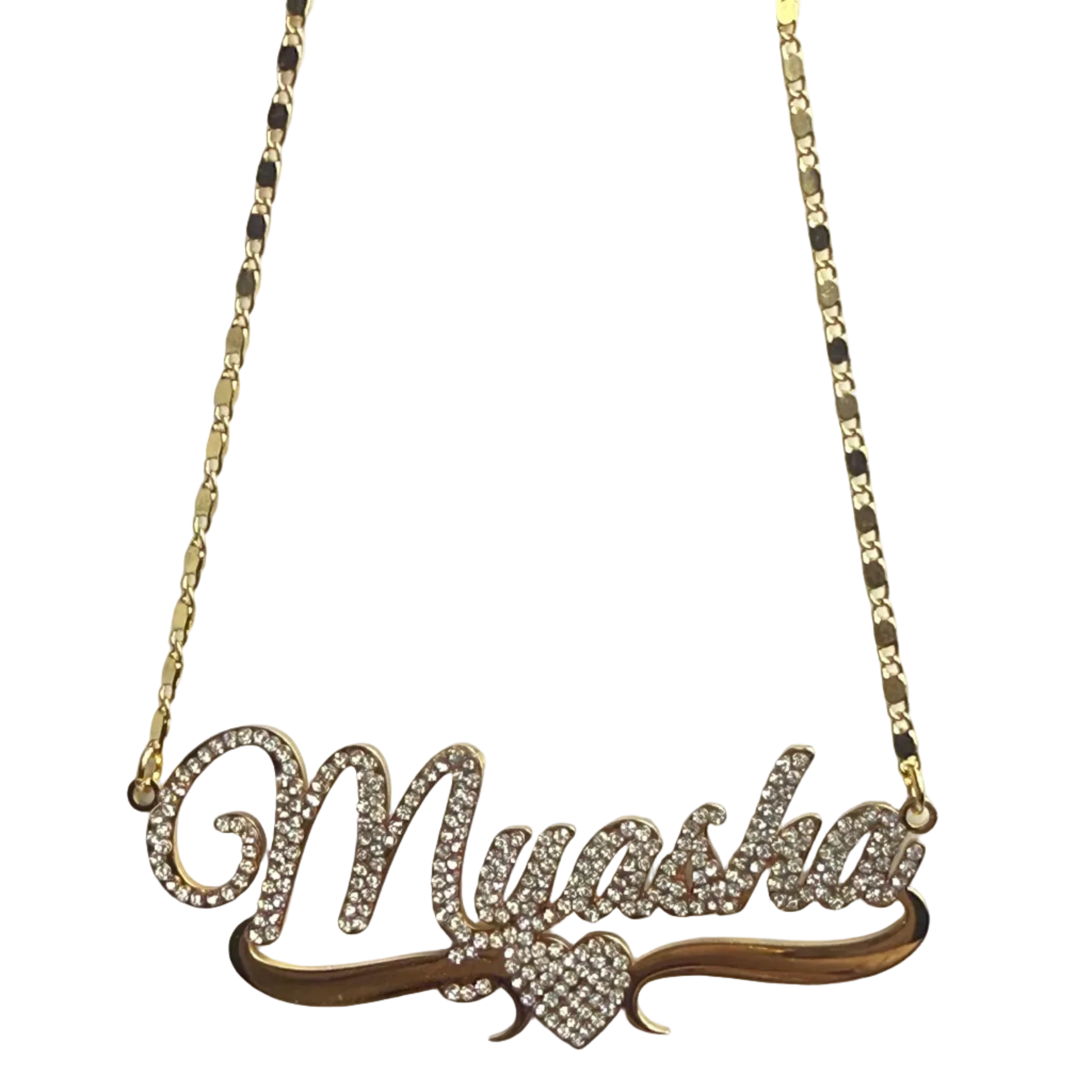 Gold necklace with a leaf-shaped pendant on a light gray background