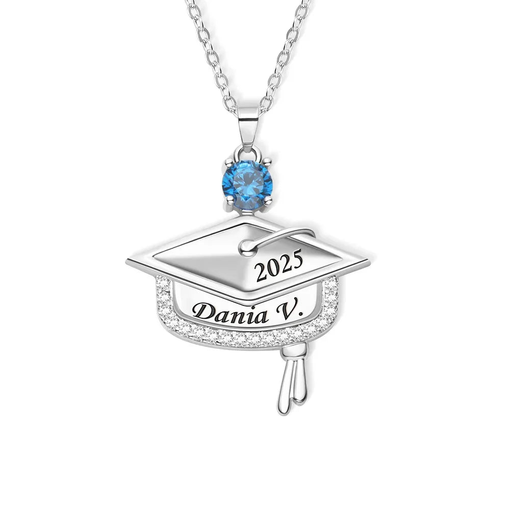 Graduation cap pendant necklace with blue gemstone birthstone and engraved name and graduation year.