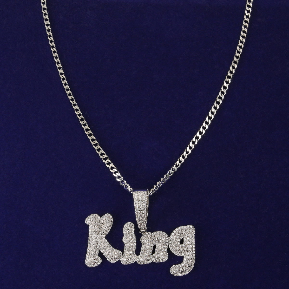 Iced-out custom bubble cursive name necklace with personalized engraving and sparkling stones – Queendom Treasurez.