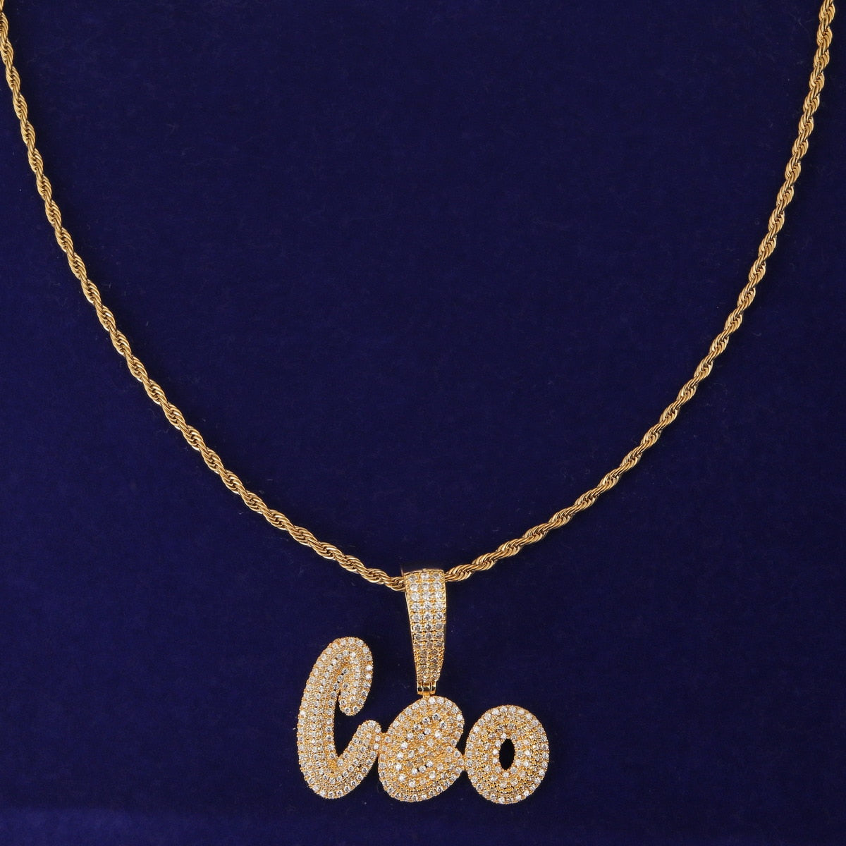 Iced-out custom bubble cursive name necklace with personalized engraving and sparkling stones – Queendom Treasurez.