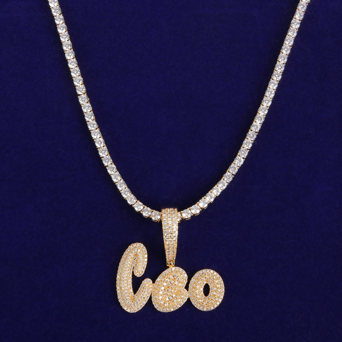 Iced-out custom bubble cursive name necklace with personalized engraving and sparkling stones – Queendom Treasurez.