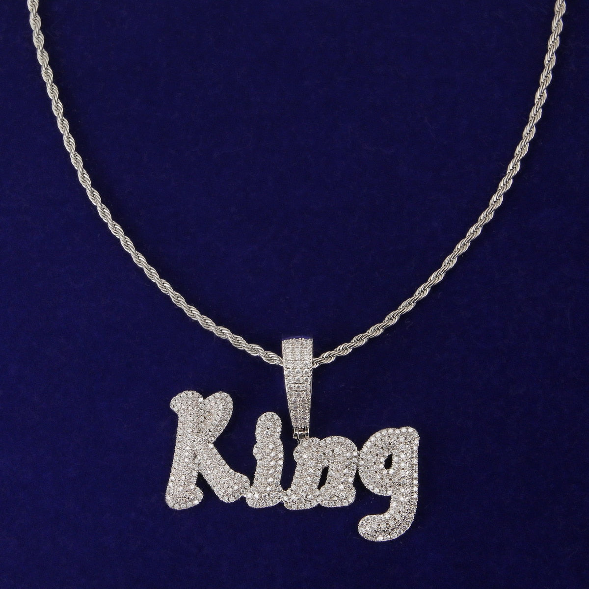 Iced-out custom bubble cursive name necklace with personalized engraving and sparkling stones – Queendom Treasurez.