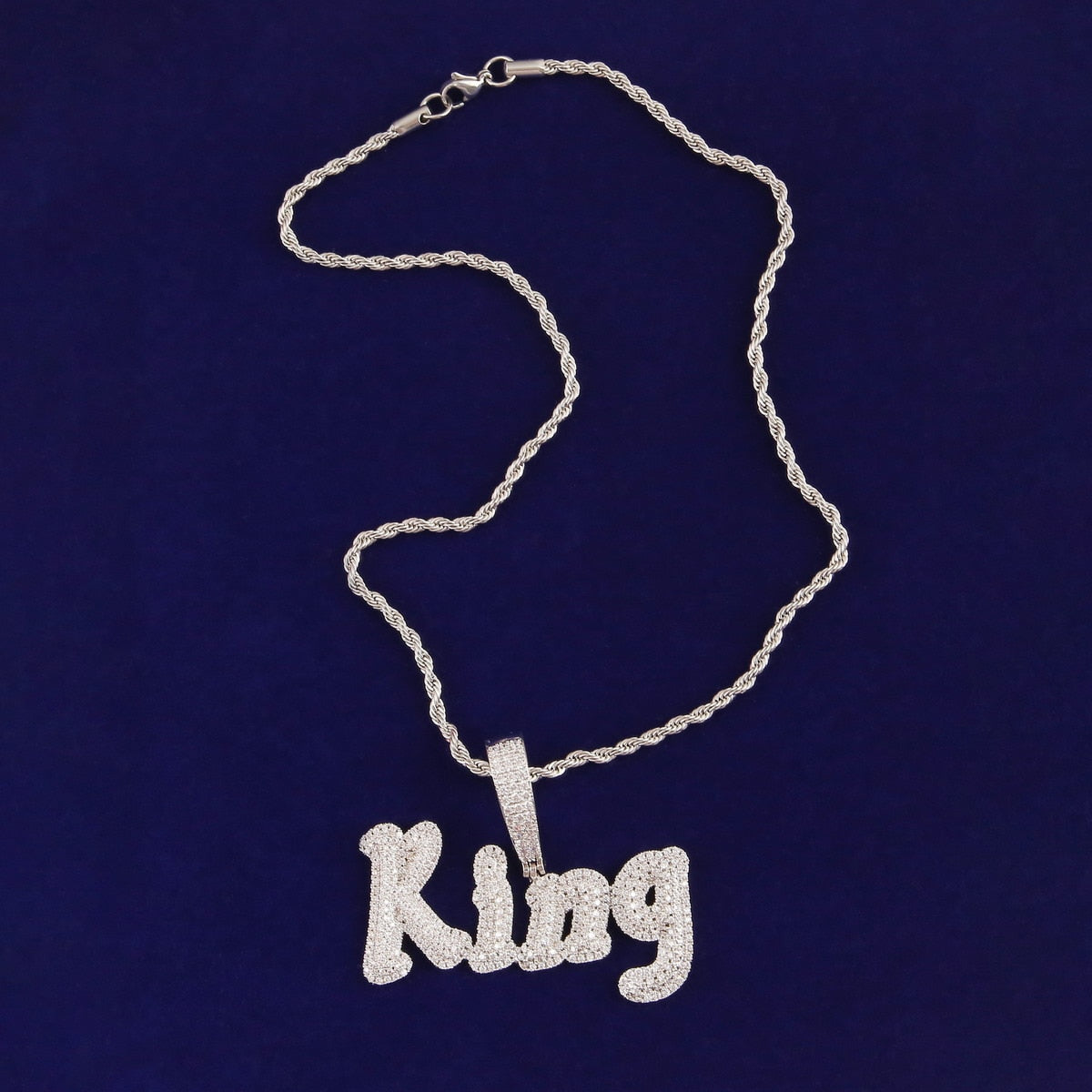 Iced-out custom bubble cursive name necklace with personalized engraving and sparkling stones – Queendom Treasurez.